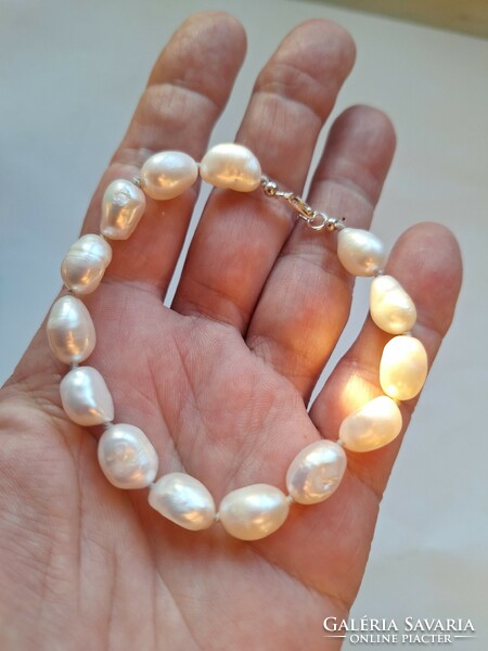 Baroque pearl bracelet with large eyes, silver clasp