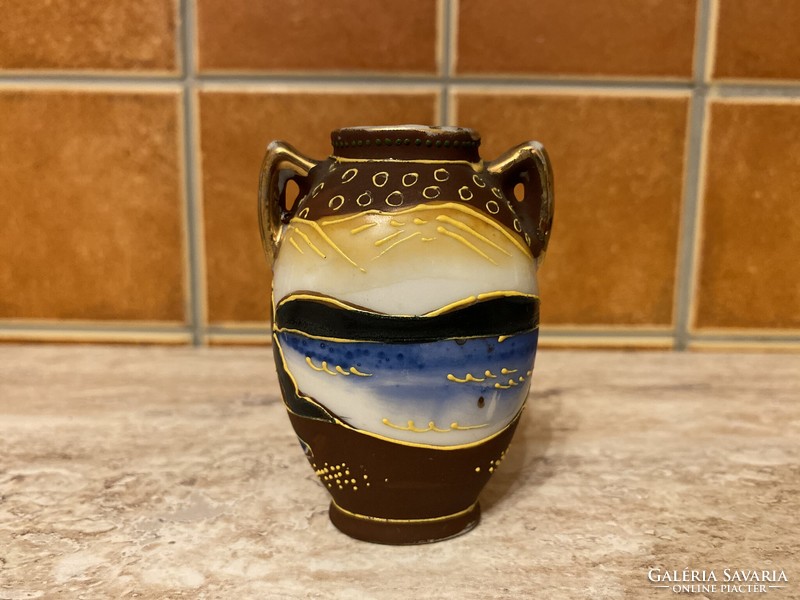 Porcelain oriental mini vase