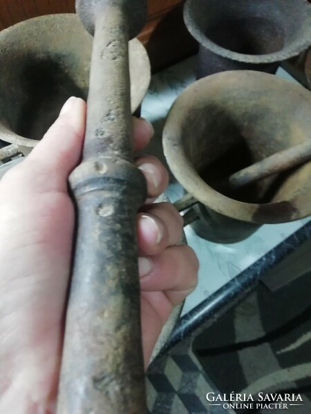 Antique iron mortars are in the condition shown in the pictures