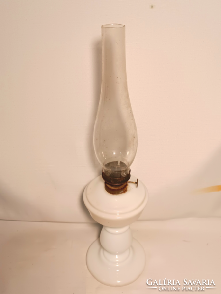 Torn glass kerosene lamp