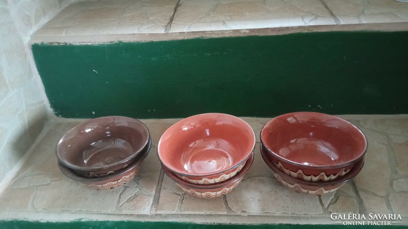 A collection of Bulgarian ceramics with a peacock pattern is for sale