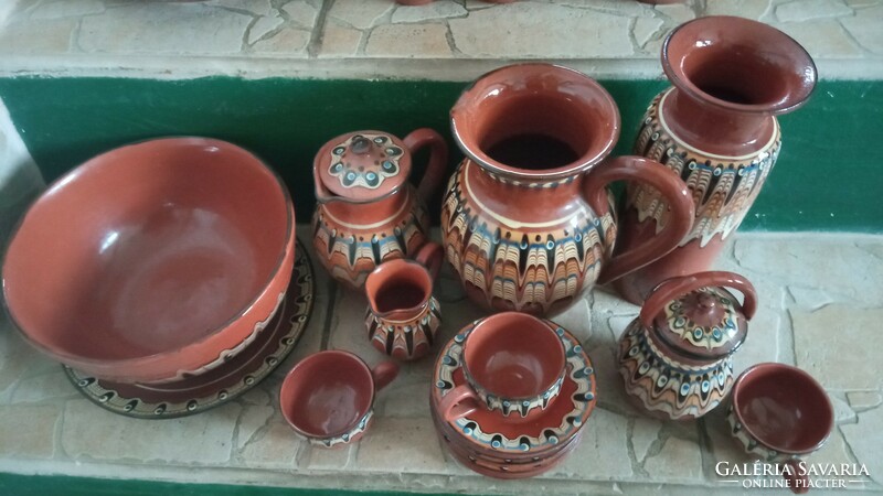 A collection of Bulgarian ceramics with a peacock pattern is for sale