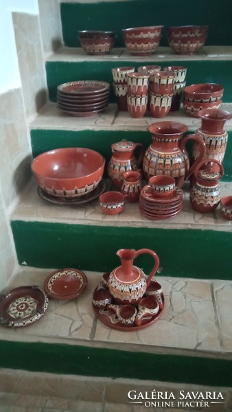 A collection of Bulgarian ceramics with a peacock pattern is for sale