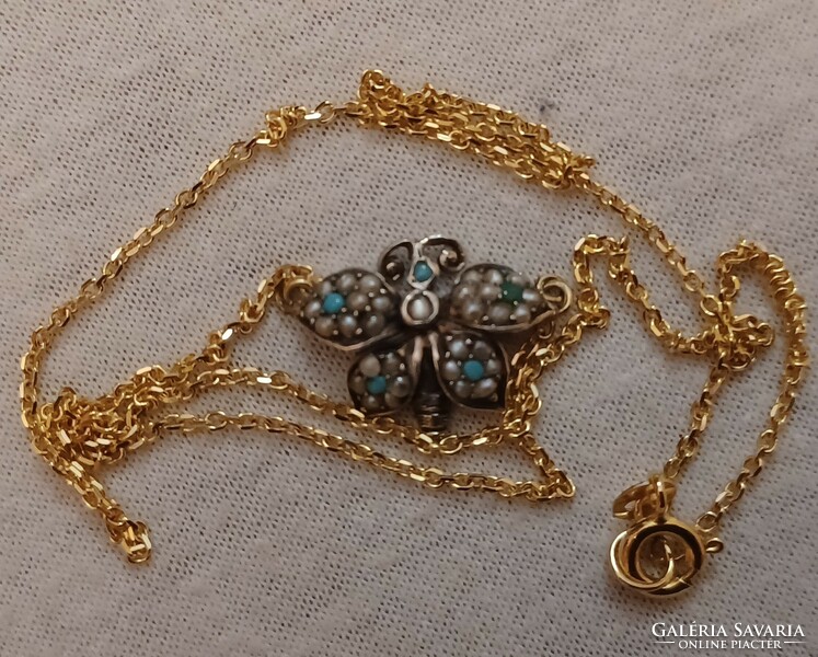 Antique gold and silver necklaces studded with turquoise and pearls