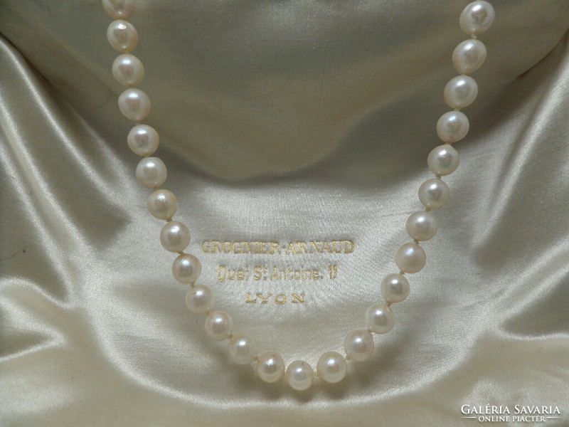 Genuine saltwater cultured pearl string with gold clasp