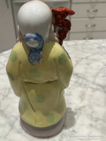 Oriental sage porcelain statue
