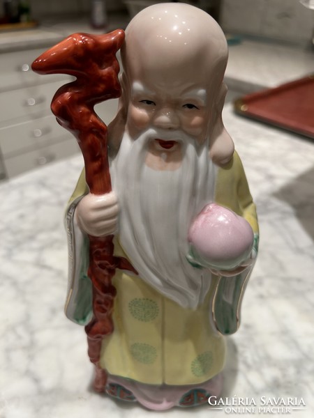 Oriental sage porcelain statue