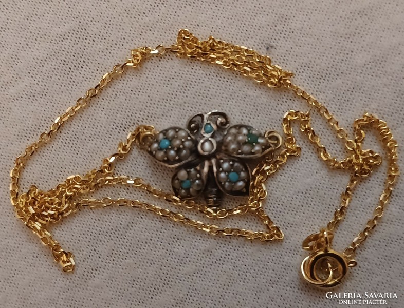 Antique gold and silver necklaces studded with turquoise and pearls