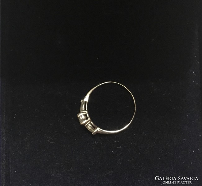 White gold ring with zirconia stones