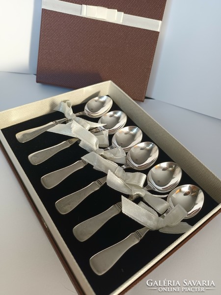 6 silver spoons in a gift box as a gift