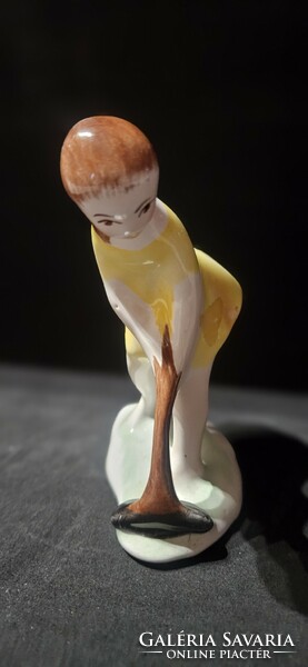 107. Wiping lady figural porcelain