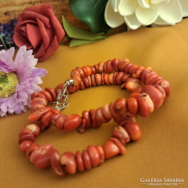 Coral string of pearls, the stone of abundance.