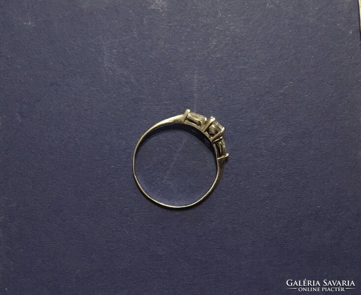White gold ring with zirconia stones