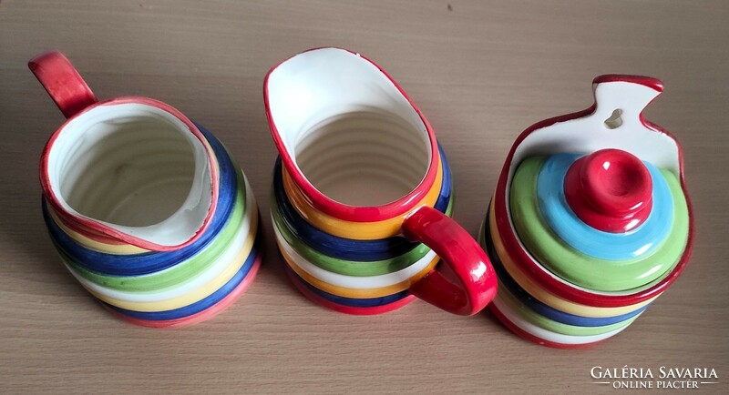 Very showy, cheerful colorful ceramic jugs and salt or sugar holder