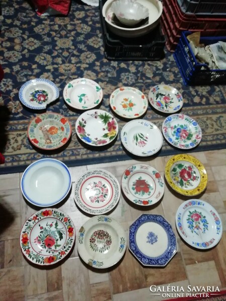 The pieces shown in the pictures from the collection of folk plates are all damaged here and there