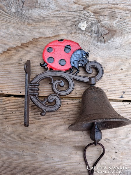 Pigeon bell with cast iron ladybird, door decoration