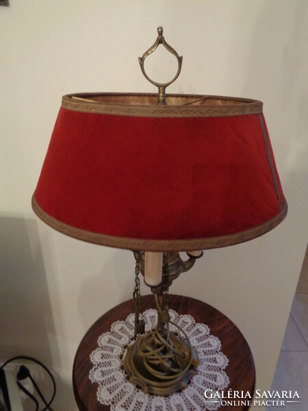 Old table lamp with its shade