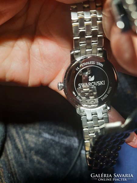 Brand new Swarovski women's silver blue watch, decorated with Swarovski crystals and accessories
