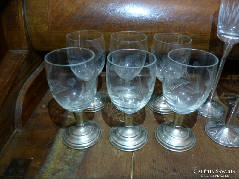 12 Pcs. Glass cup with metal base.
