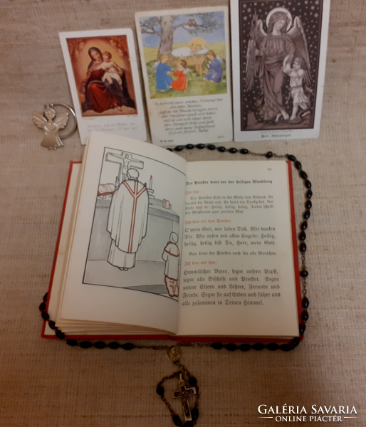 Old German-language scott's measurement book for the smallest children with a rosary at Mass