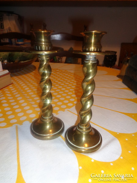 Pair of copper candle holders with a twisted stem, 8 x 21 cm