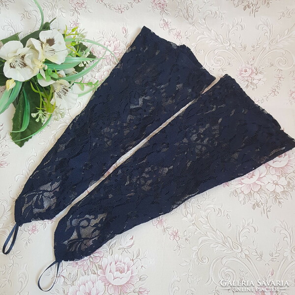 New, custom-made, dark blue lace gloves that can be hung on the finger
