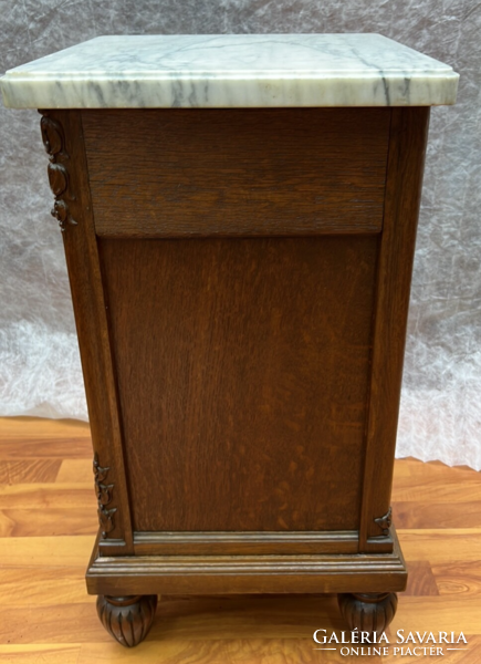 Antique carved oak chest of drawers with marble top