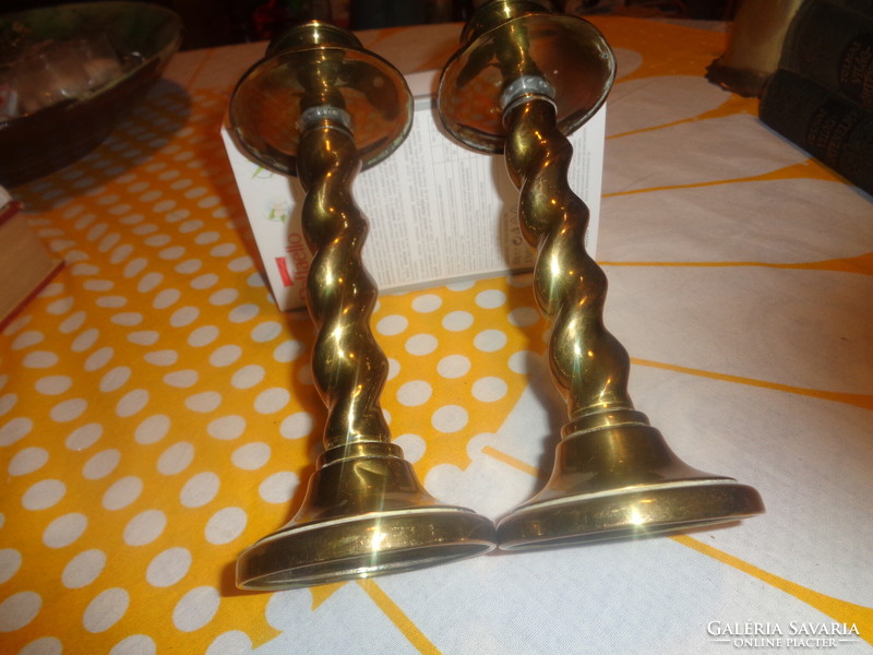 Pair of copper candle holders with a twisted stem, 8 x 21 cm