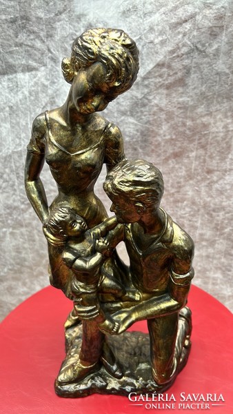 Gypsum statue depicting a family