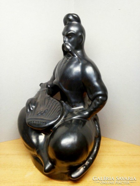 Cossack musician ataman with his instrument. Small plastic 1960s rarity for your showcase