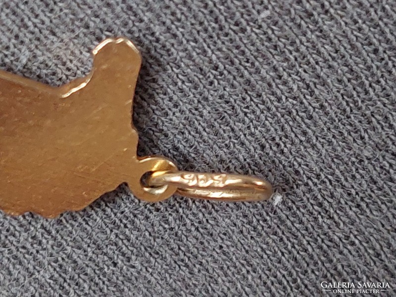 Equestrian gold pendant. 14 K.