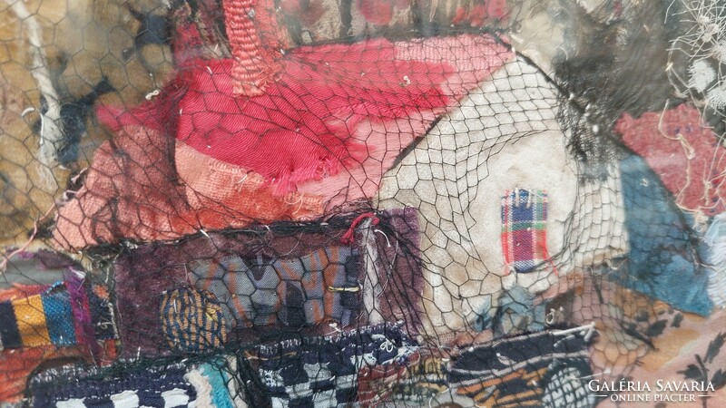 A picture applied from fabrics, a street scene