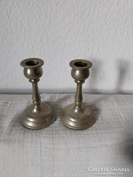 Small metal candle holders