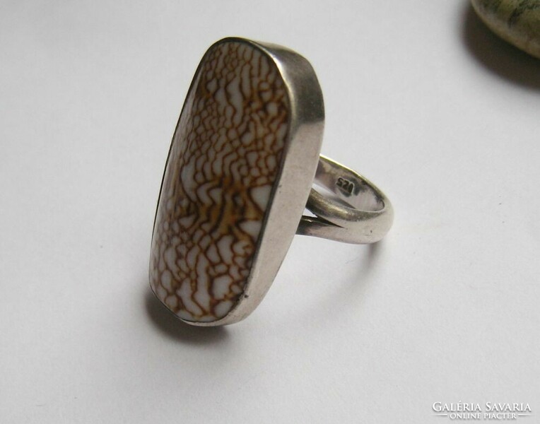 Silver ring with a rare sea snail shell inlay