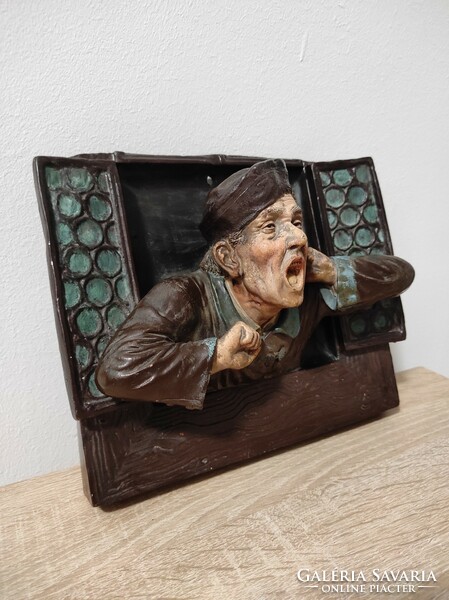 Yawning butler in the window, ceramic wall decoration!