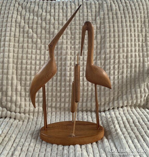 Retro wooden egret and stork with reeds