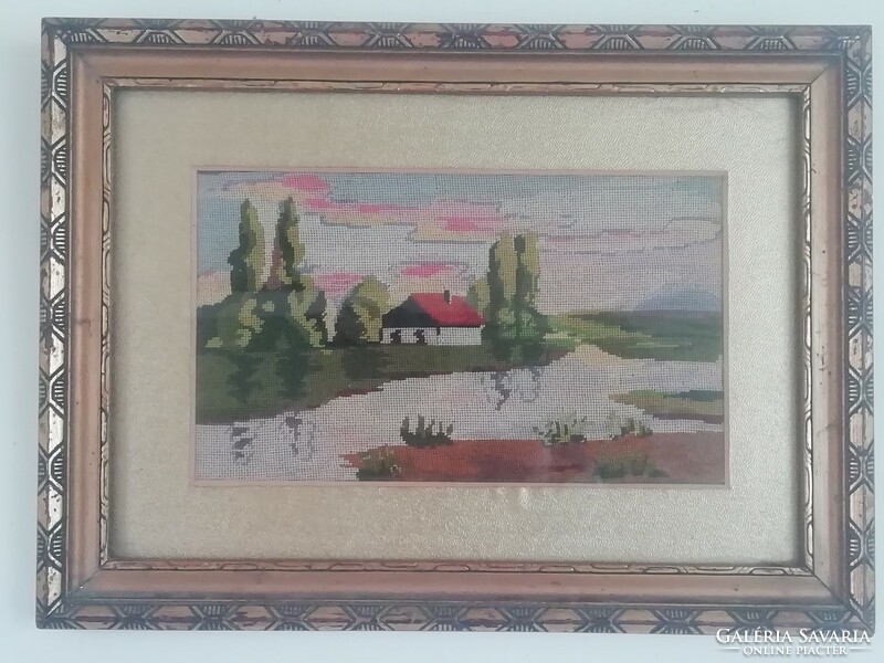 Old needle tapestry landscape with frame