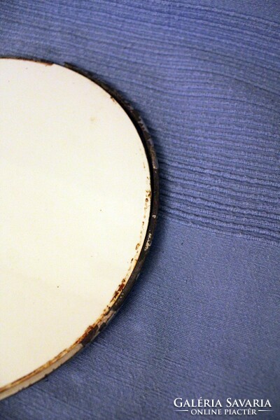 An old earthenware tray is damaged