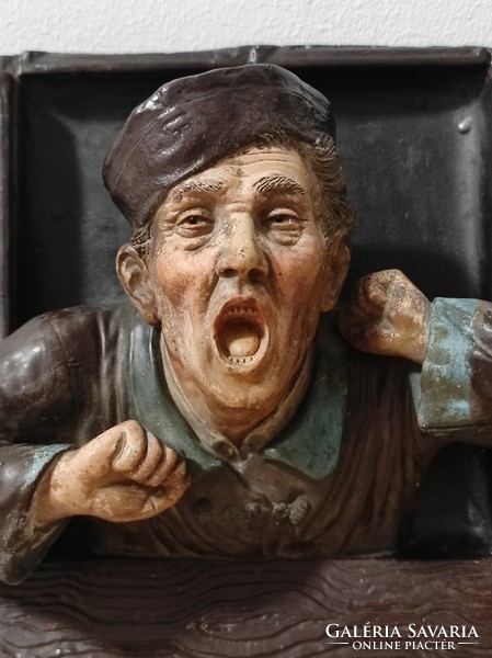 Yawning butler in the window, ceramic wall decoration!