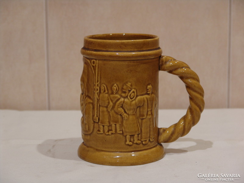 Old earthenware mug