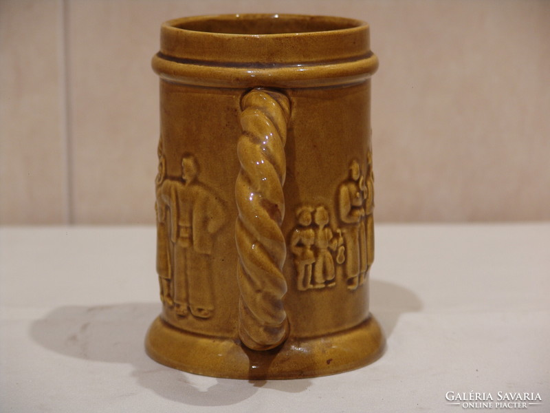 Old earthenware mug