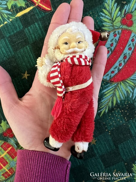 Old plastic Santa Claus Christmas tree decoration with clips