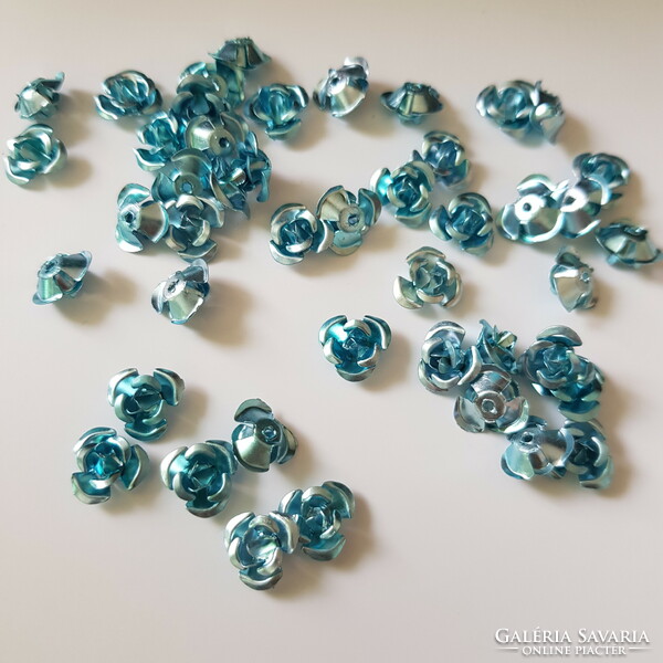 New, blue miniature metal rose ornament, piece of decorative element