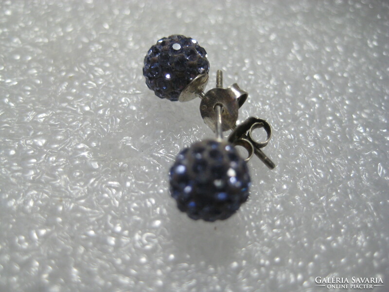 Old earrings with many small blue stones