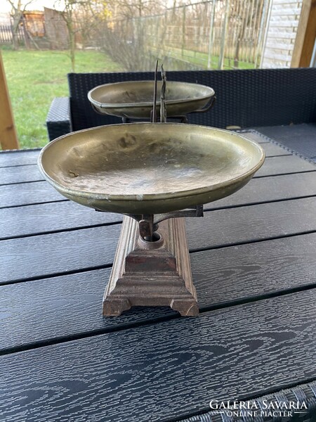 Old cast iron scale with copper pans