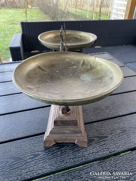 Old cast iron scale with copper pans