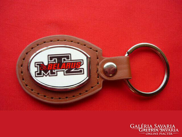 Mtz oval metal key ring on a leather base