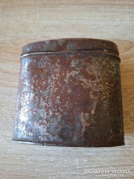Old metal tobacco or ammo holder