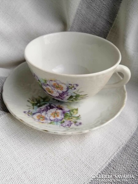 Antique tea cup with coaster