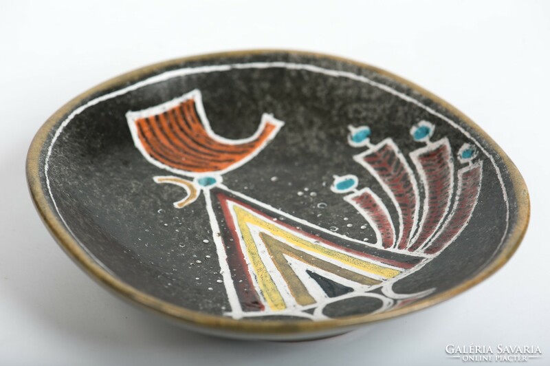 Paul Francis in ceramic bowl